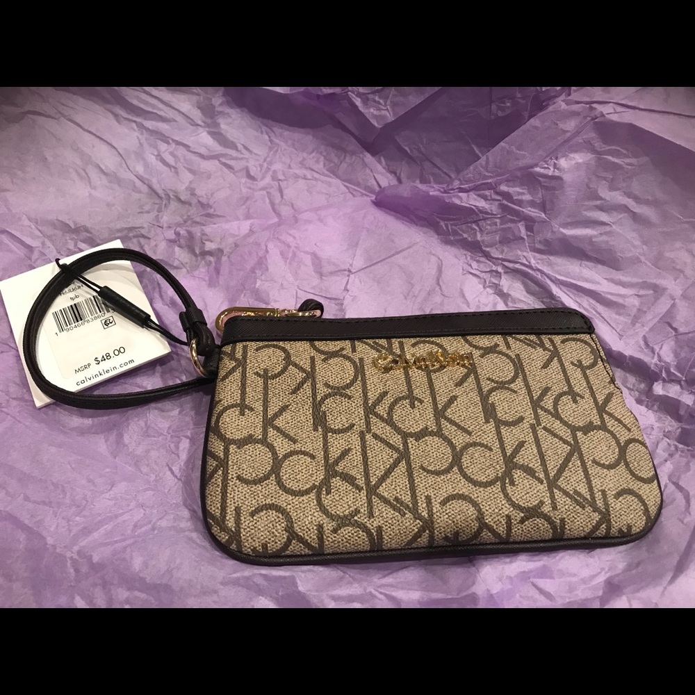 Calvin Klein wristlet . New with tag on